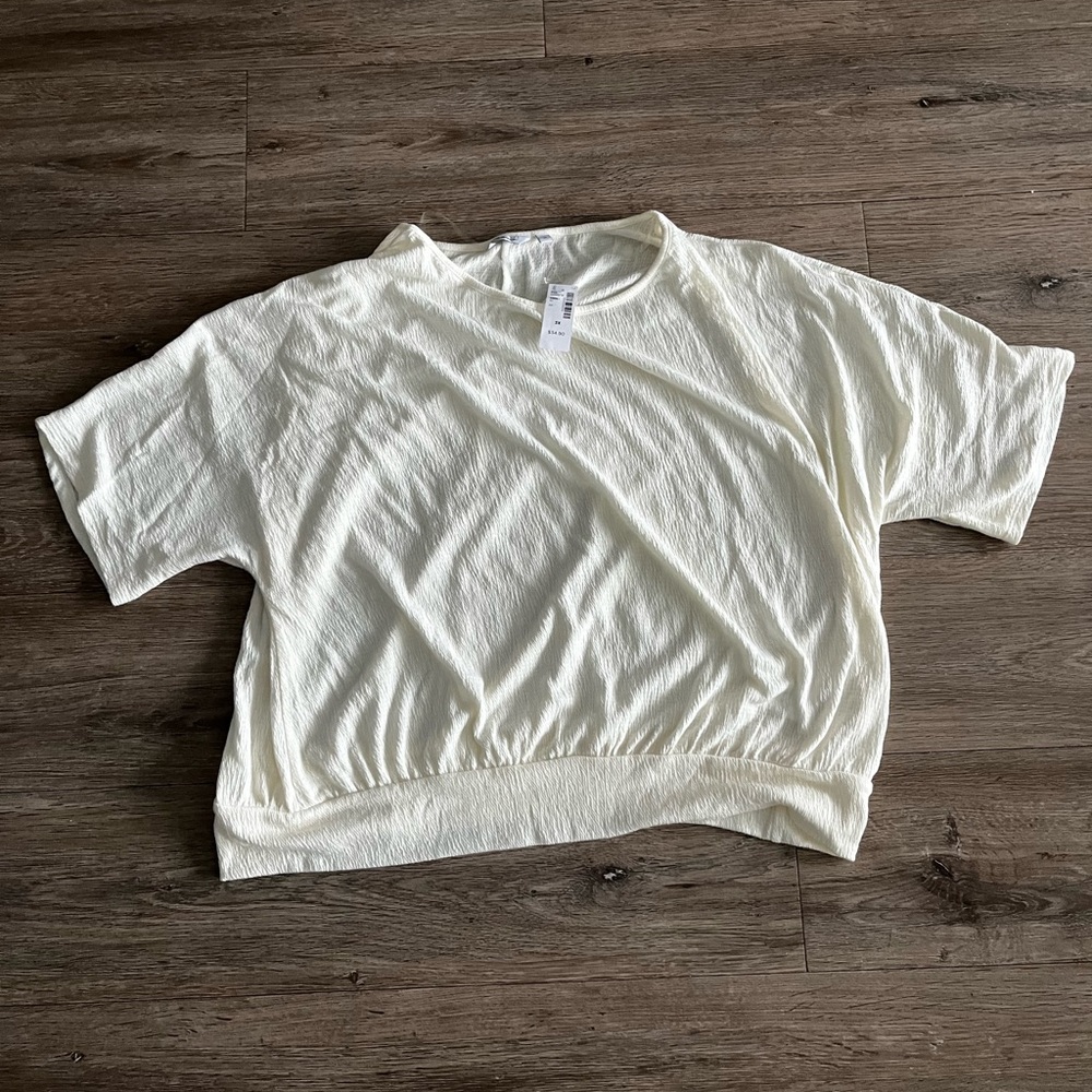 Cream Reitman’s women’s t shirt.